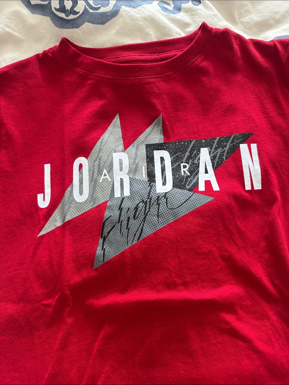 Jordan Red Short Sleeve Tee with Bold Lightning Graphic - Picture 2 of 4
